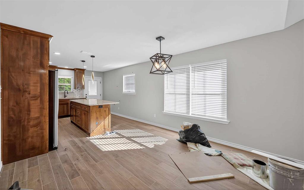 926 South Academy Avenue Tyler, TX 75701 - Photo 12 of 33 a bedroom with a bed and a window
