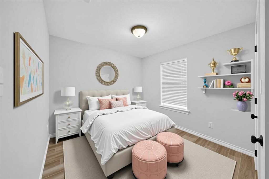 926 South Academy Avenue Tyler, TX 75701 - Photo 25 of 33 a bedroom with a bed and a window