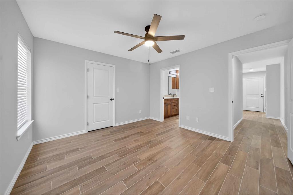 926 South Academy Avenue Tyler, TX 75701 - Photo 28 of 33 wooden floor in an empty room with a window