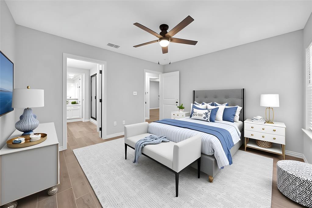 926 South Academy Avenue Tyler, TX 75701 - Photo 30 of 33 a bedroom with a bed and ceiling fan