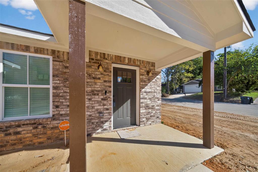 926 South Academy Avenue Tyler, TX 75701 - Photo 5 of 33 a porch with seating space