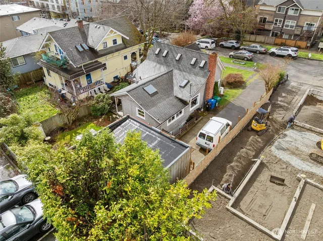 an aerial view of a house with outdoor space