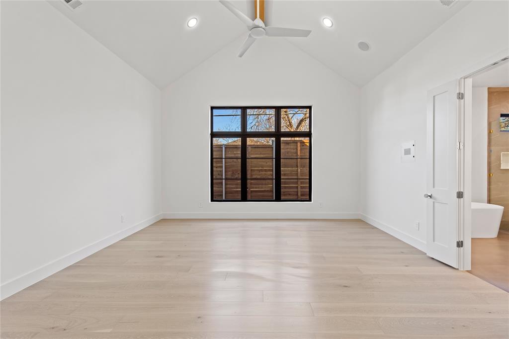 7624 Roper Street Dallas, TX 75209 - Photo 12 of 36 an empty room with windows and closet