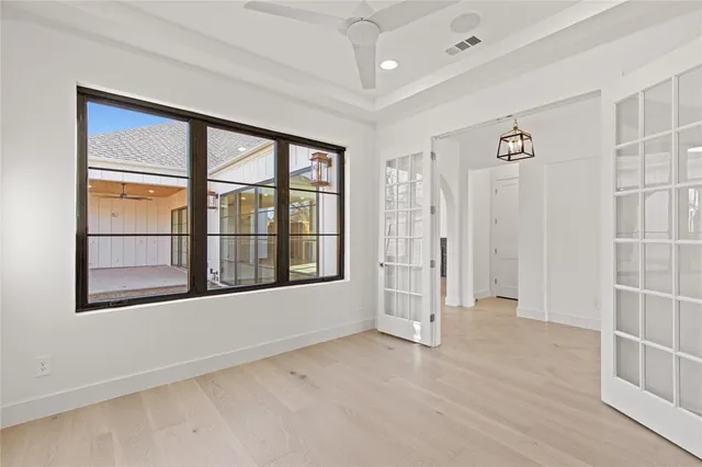 an empty room with windows