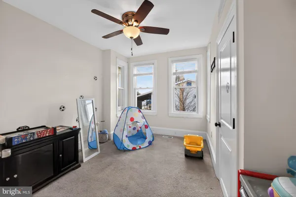 a view of kids room with toys