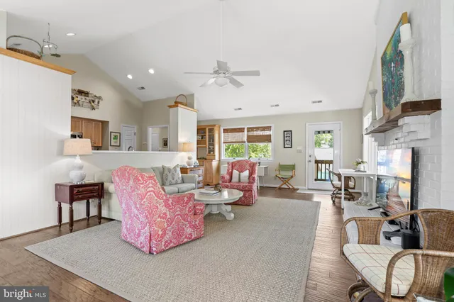 a kitchen with sink stove and cabinets