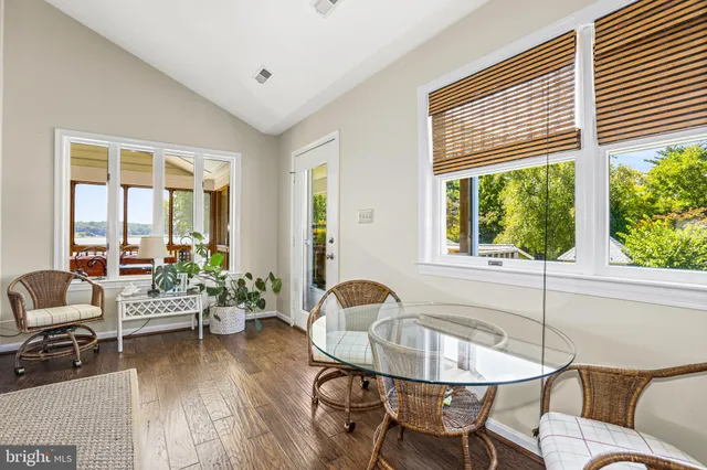 a kitchen with a counter space a sink appliances and a window