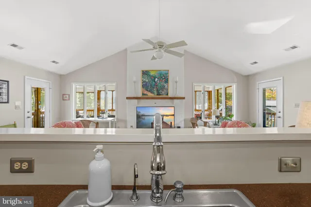 a view of a livingroom with furniture and window