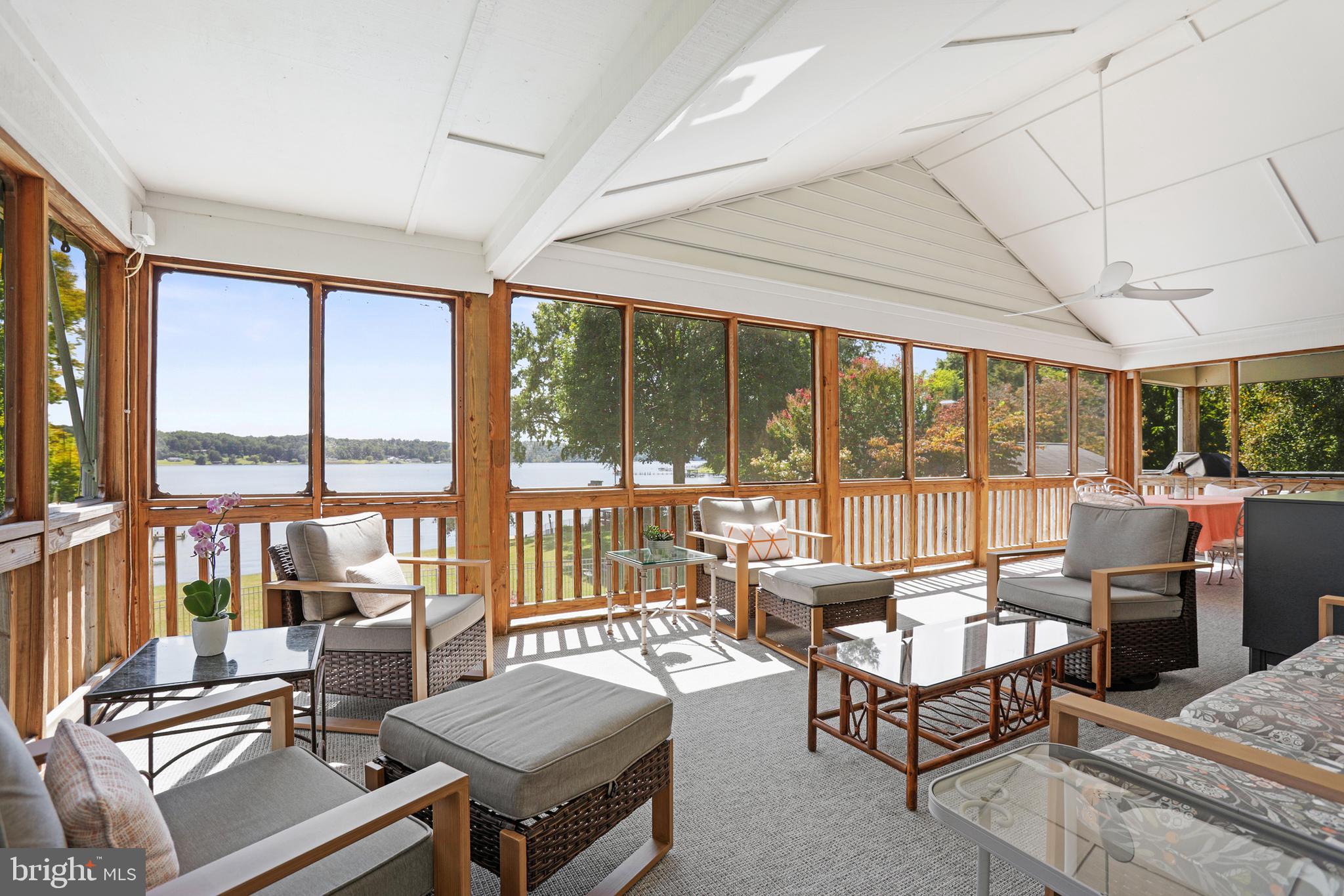 638 Marlborough Point Road Stafford, VA 22554 - Photo 19 of 58 a living room with furniture large windows and wooden floor