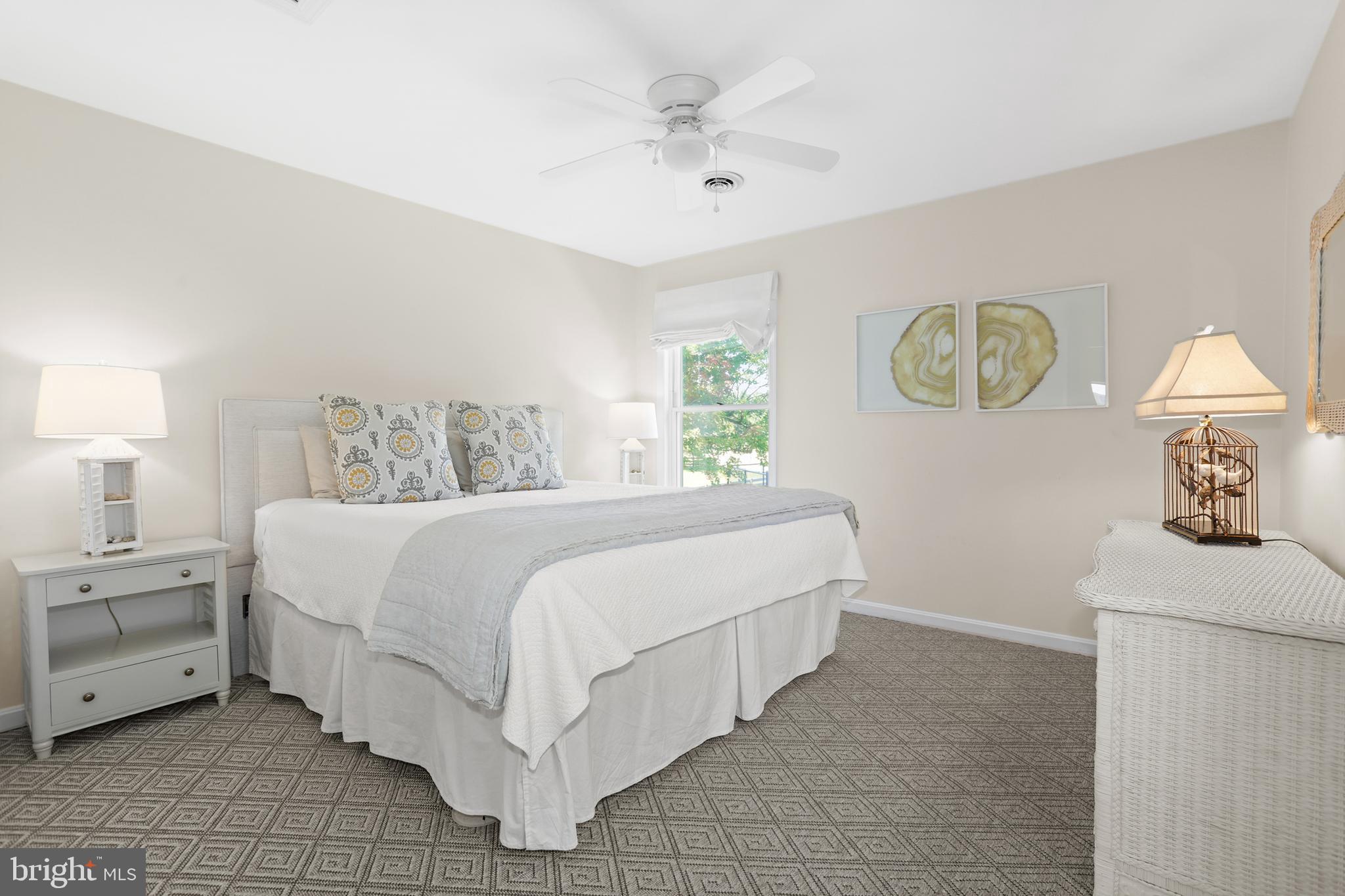 638 Marlborough Point Road Stafford, VA 22554 - Photo 20 of 58 a bedroom with a bed and a chandelier