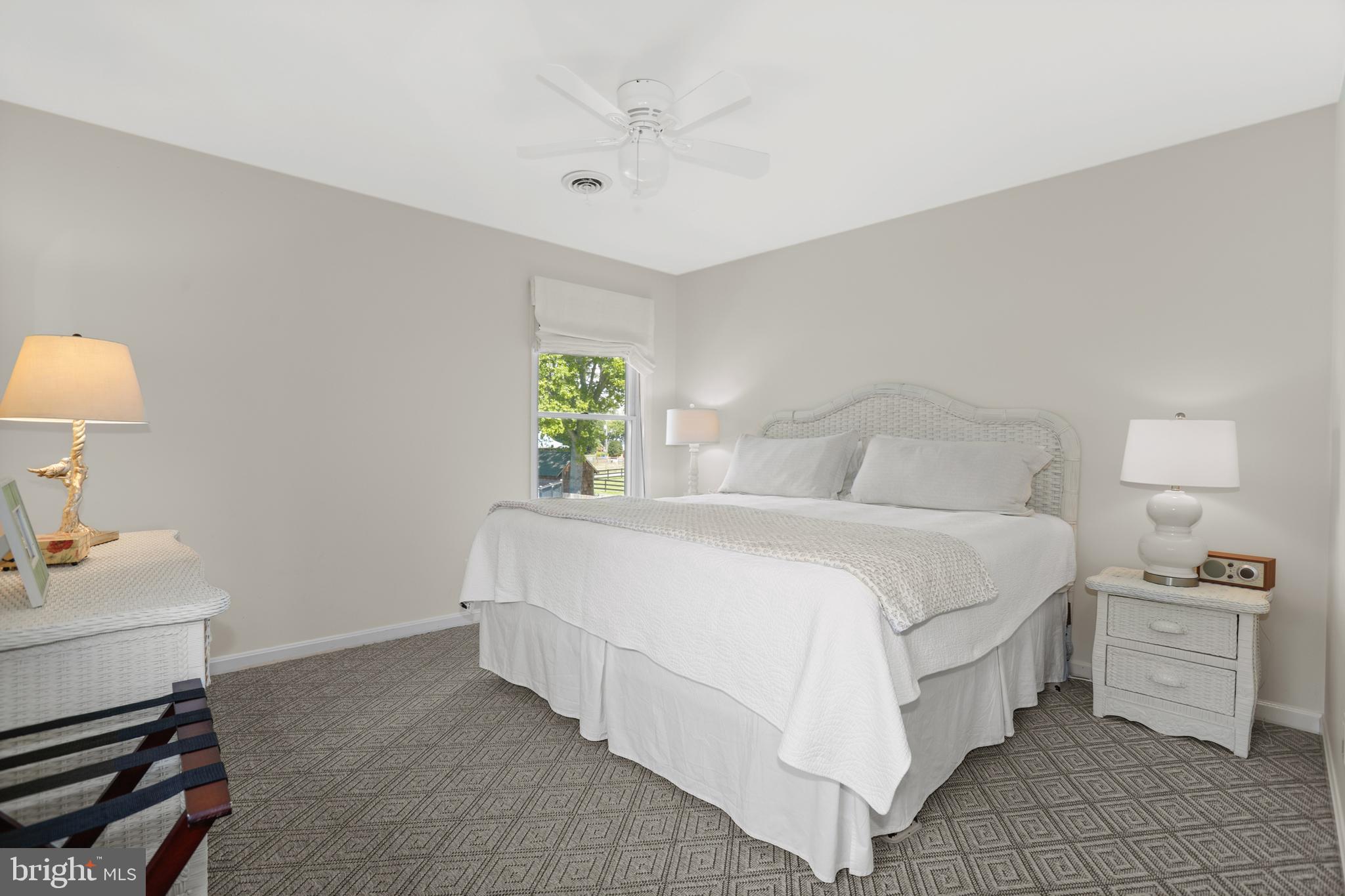 638 Marlborough Point Road Stafford, VA 22554 - Photo 23 of 58 a bedroom with a bed and a lamp on dresser