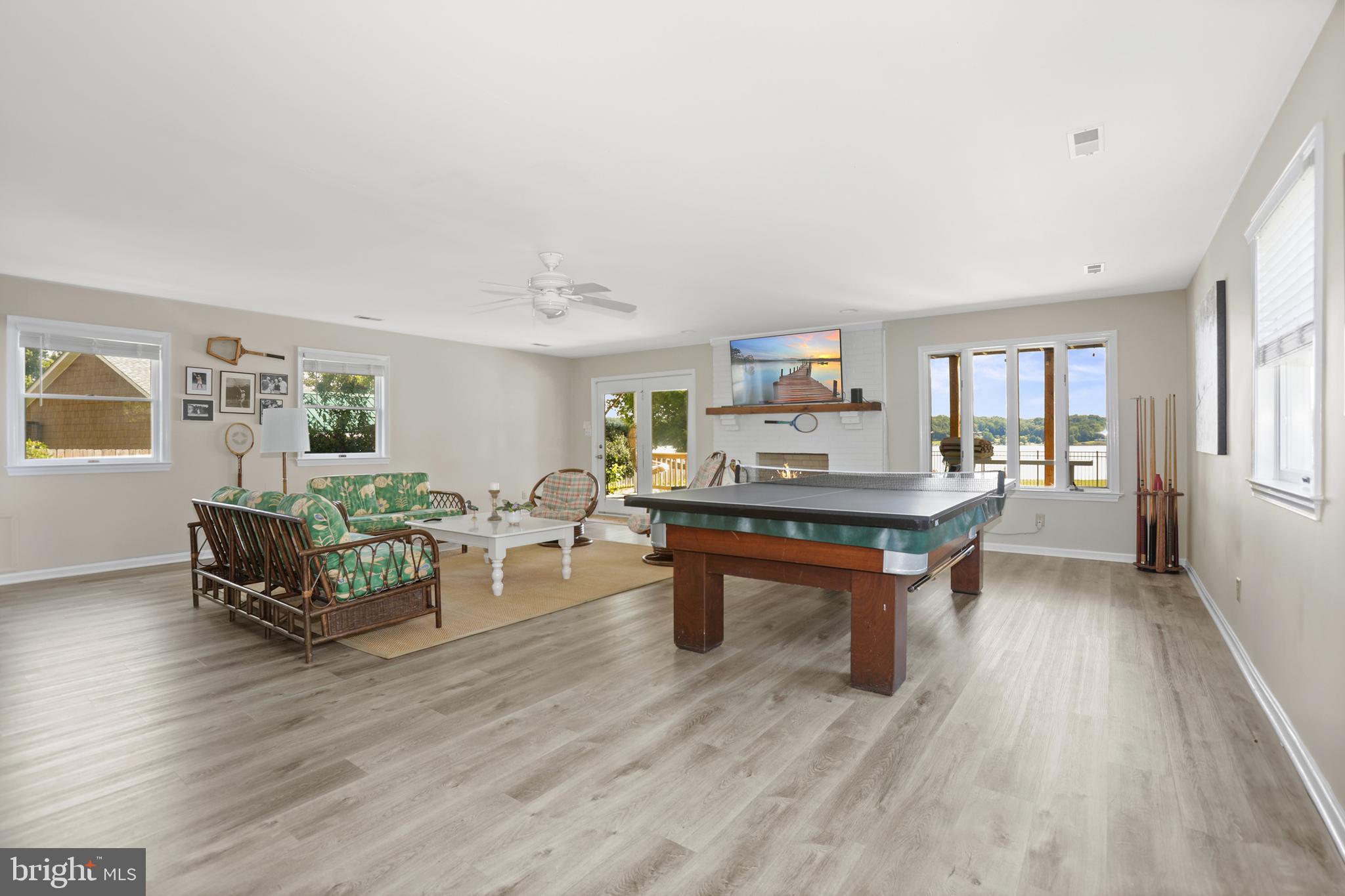 638 Marlborough Point Road Stafford, VA 22554 - Photo 26 of 58 a living room with furniture and a wooden floor