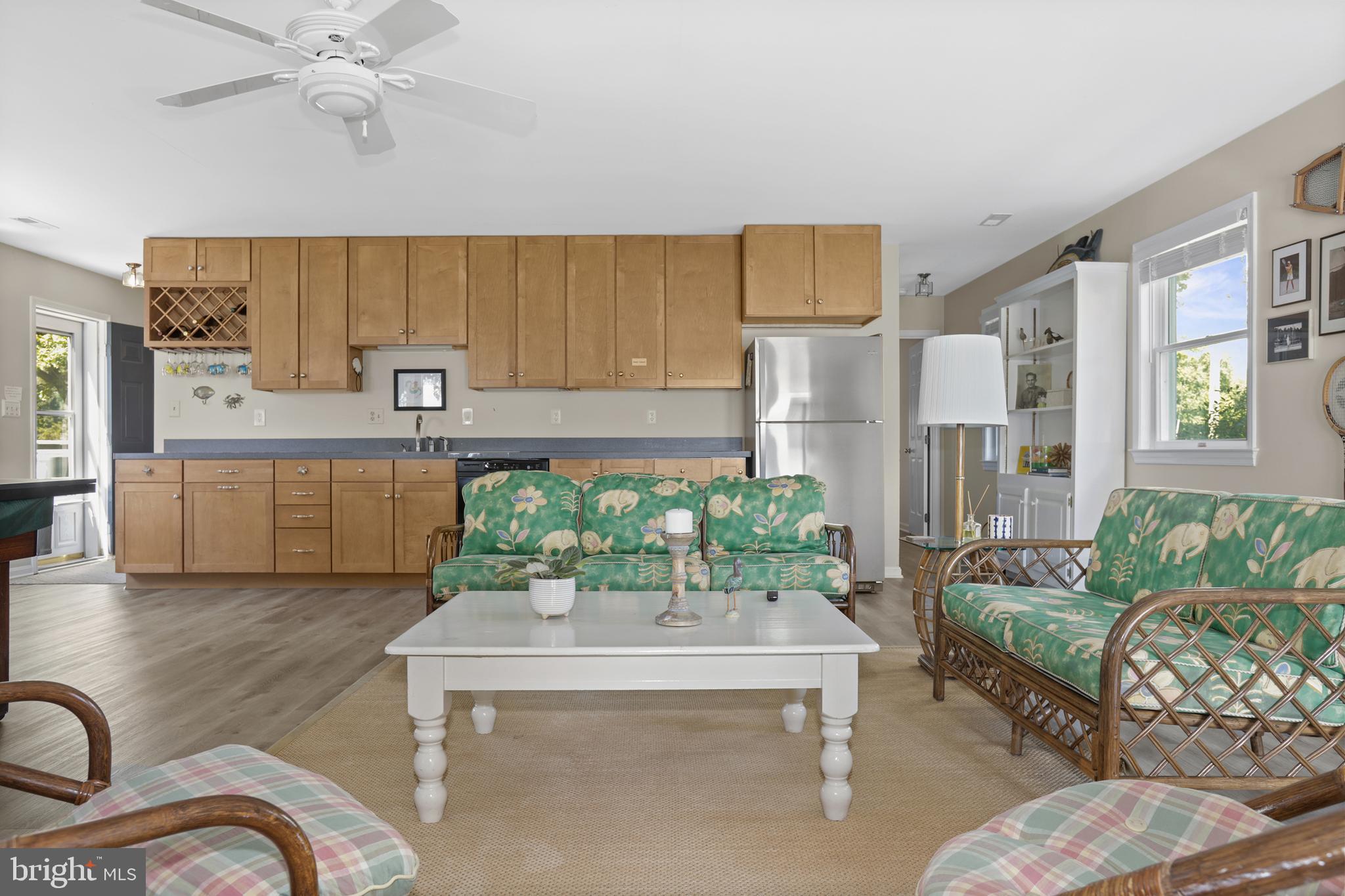 638 Marlborough Point Road Stafford, VA 22554 - Photo 27 of 58 a living room with furniture and a chandelier
