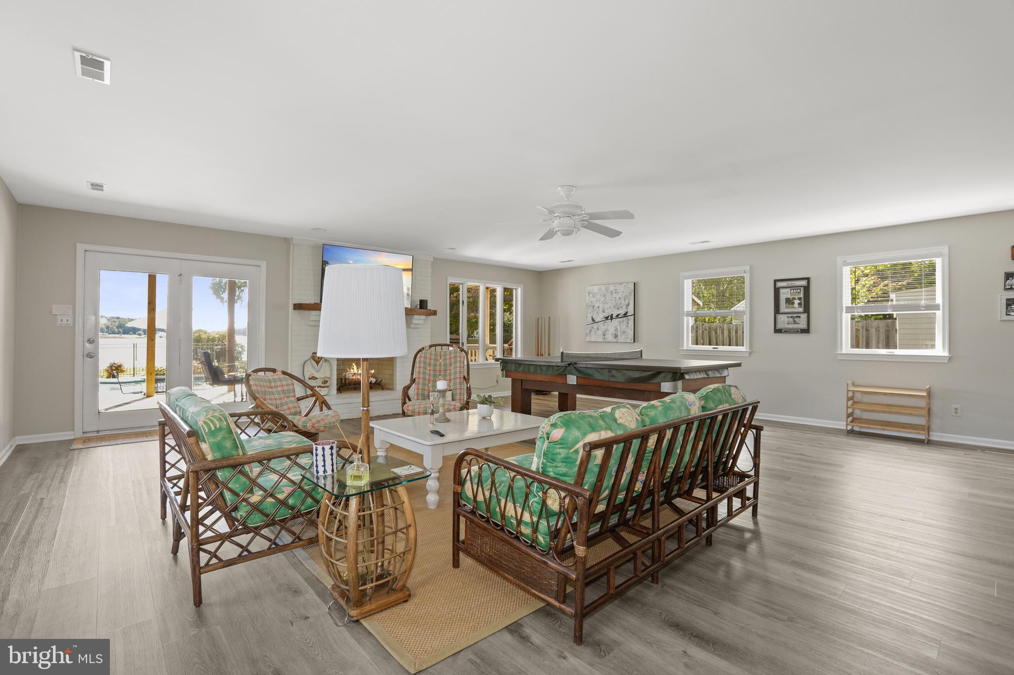 638 Marlborough Point Road Stafford, VA 22554 - Photo 29 of 58 a living room with furniture and a wooden floor