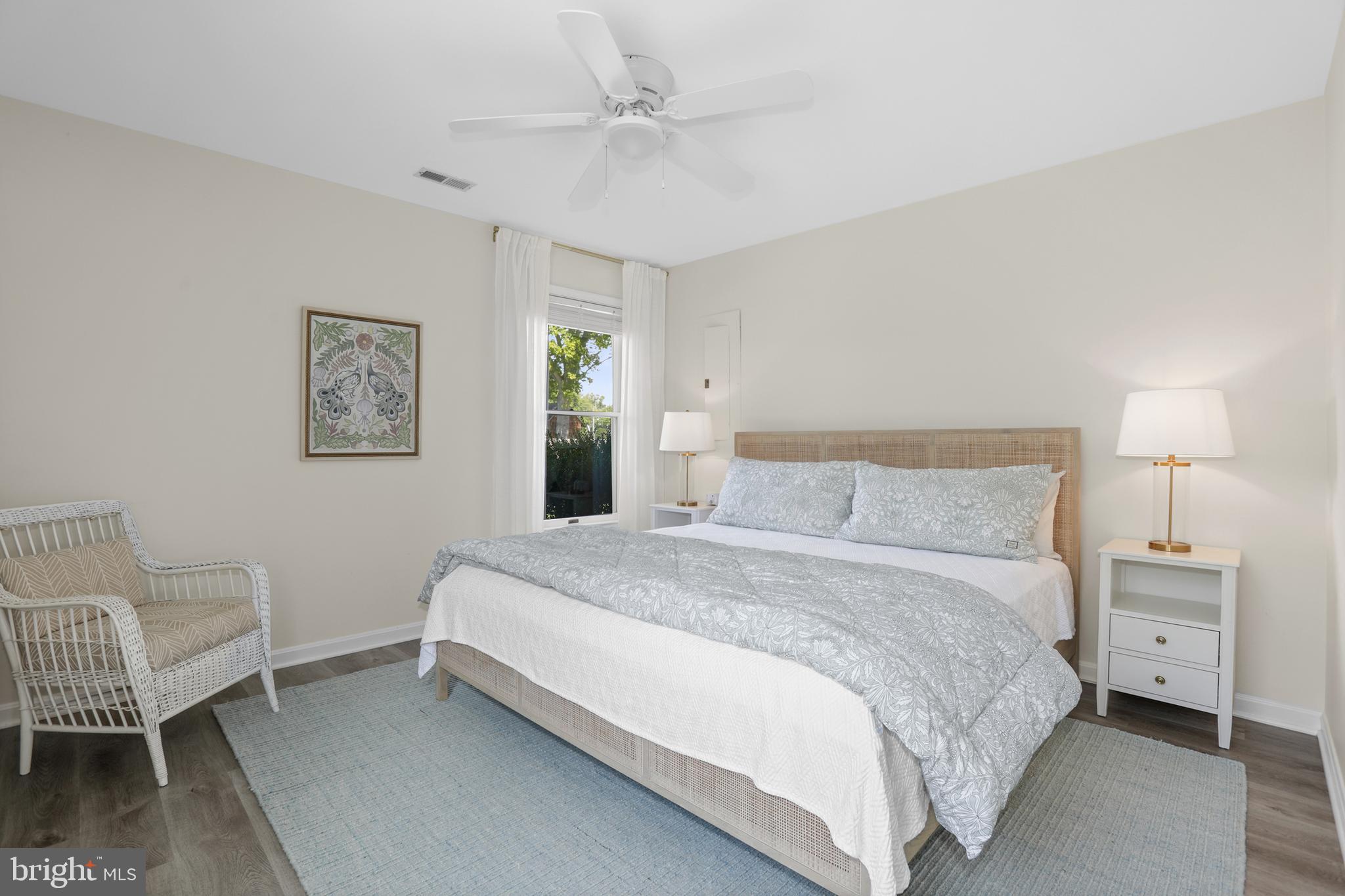 638 Marlborough Point Road Stafford, VA 22554 - Photo 31 of 58 a bedroom with a bed and a chair