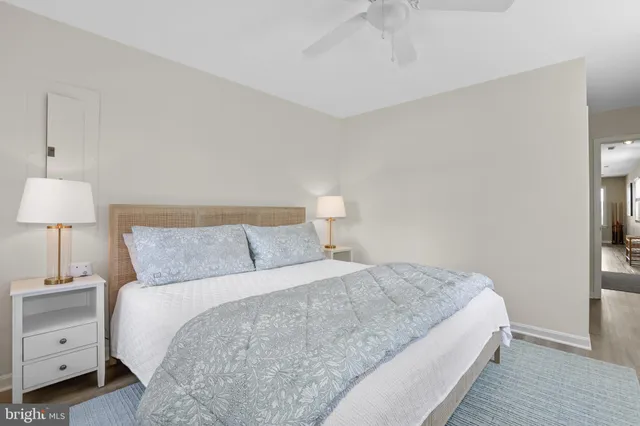 a bedroom with a bed and a view of bathroom