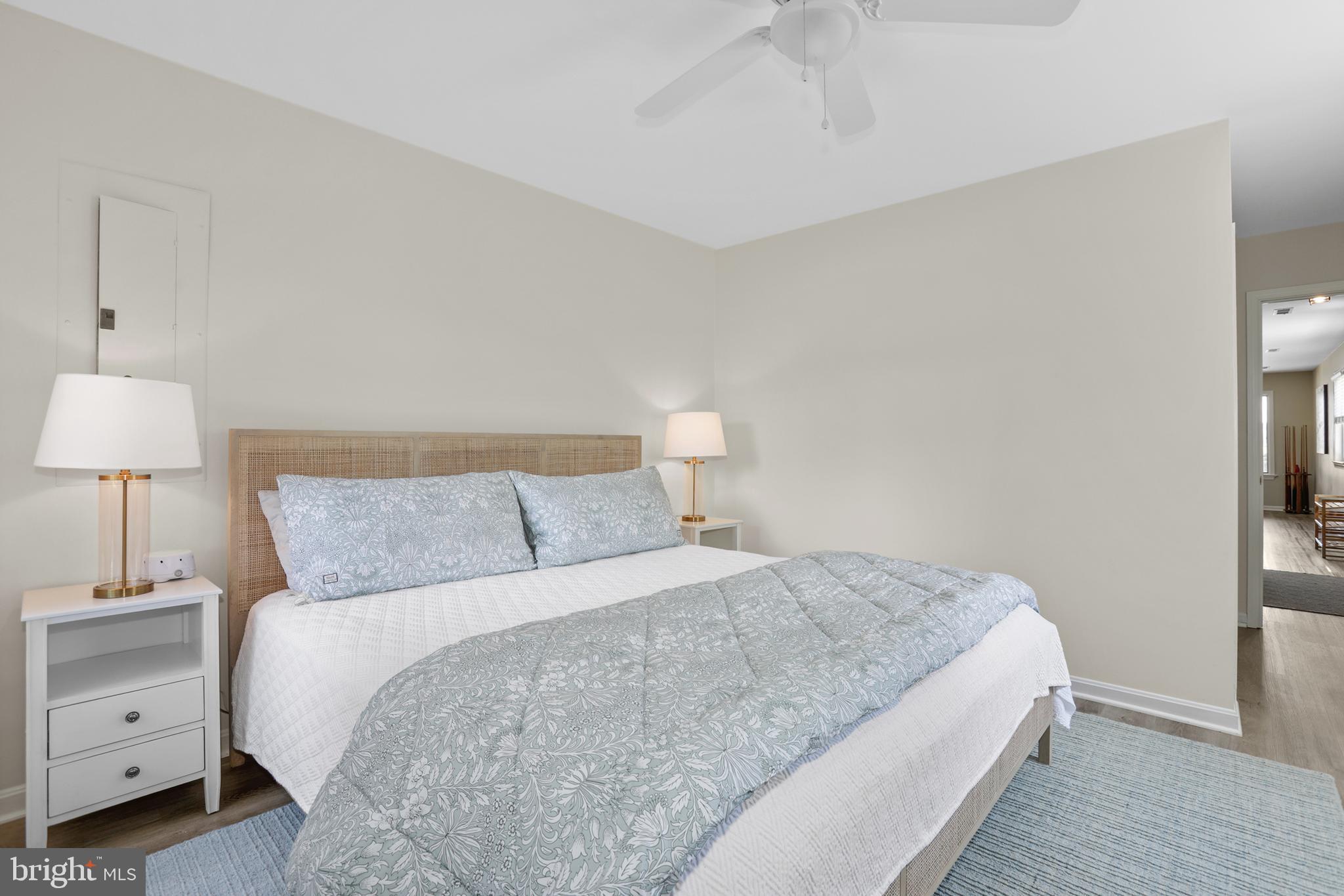 638 Marlborough Point Road Stafford, VA 22554 - Photo 32 of 58 a bedroom with a bed and a lamp