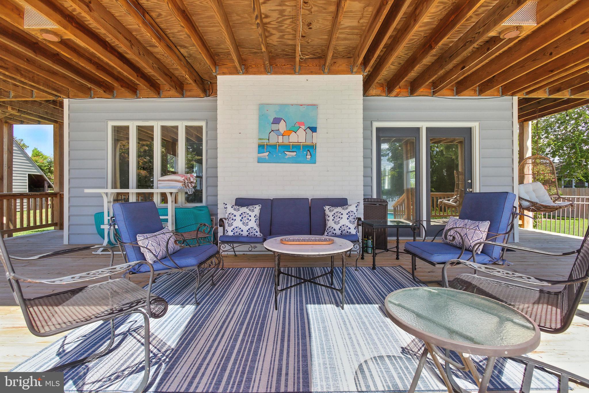 638 Marlborough Point Road Stafford, VA 22554 - Photo 42 of 58 a outdoor space with furniture a rug and a potted plant