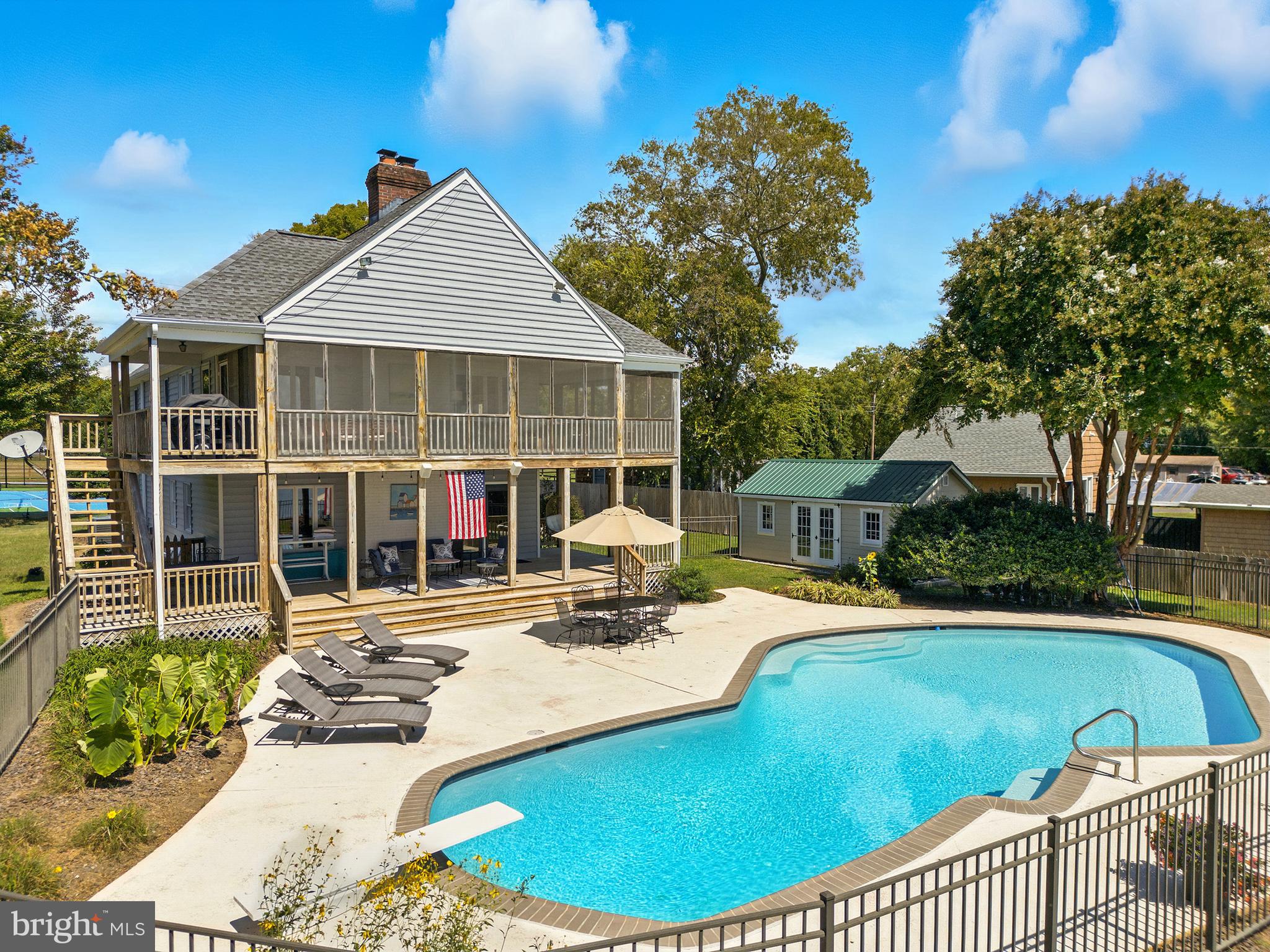 638 Marlborough Point Road Stafford, VA 22554 - Photo 43 of 58 a view of a house with swimming pool and sitting area