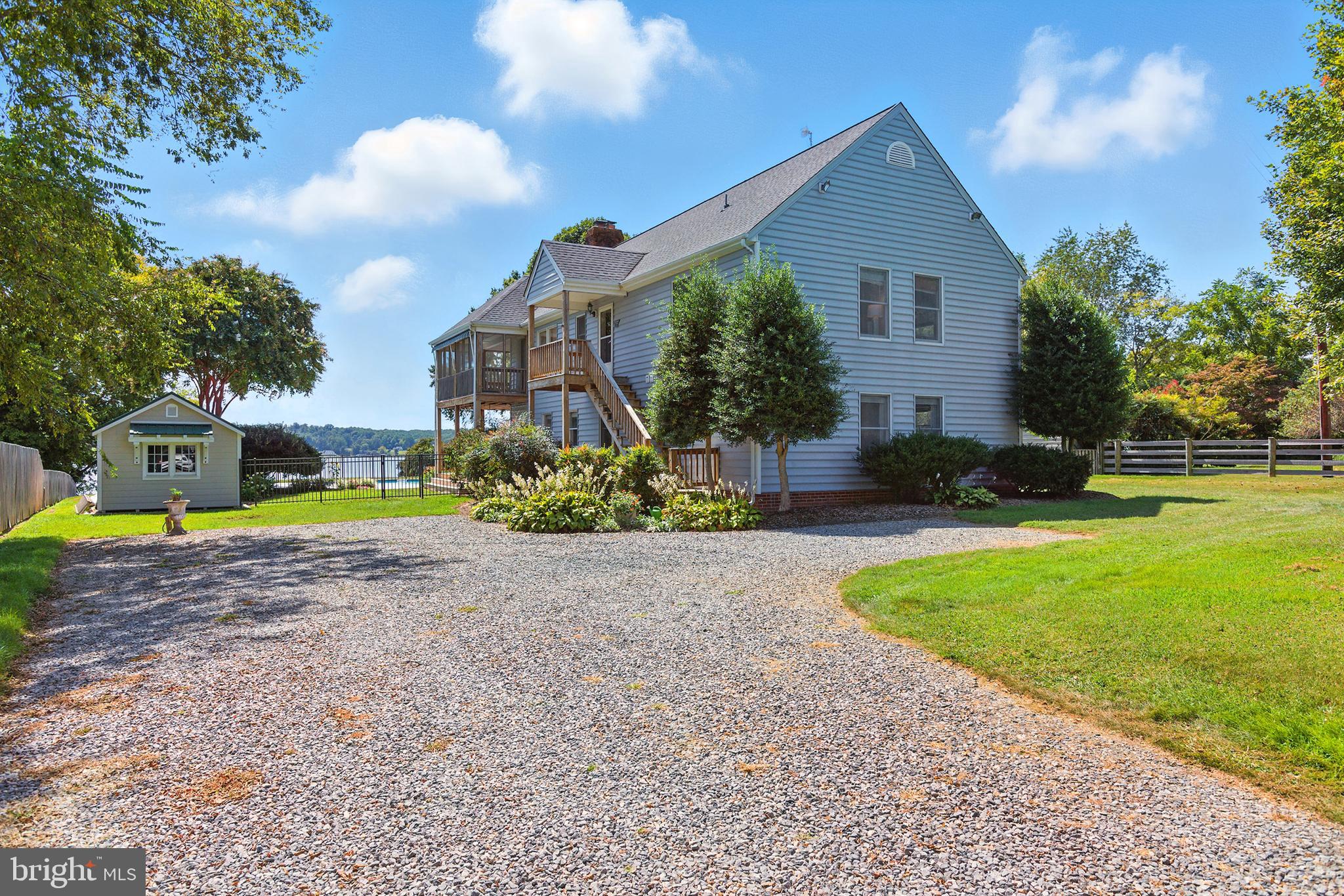 638 Marlborough Point Road Stafford, VA 22554 - Photo 45 of 58 a view of a house with a backyard and plants
