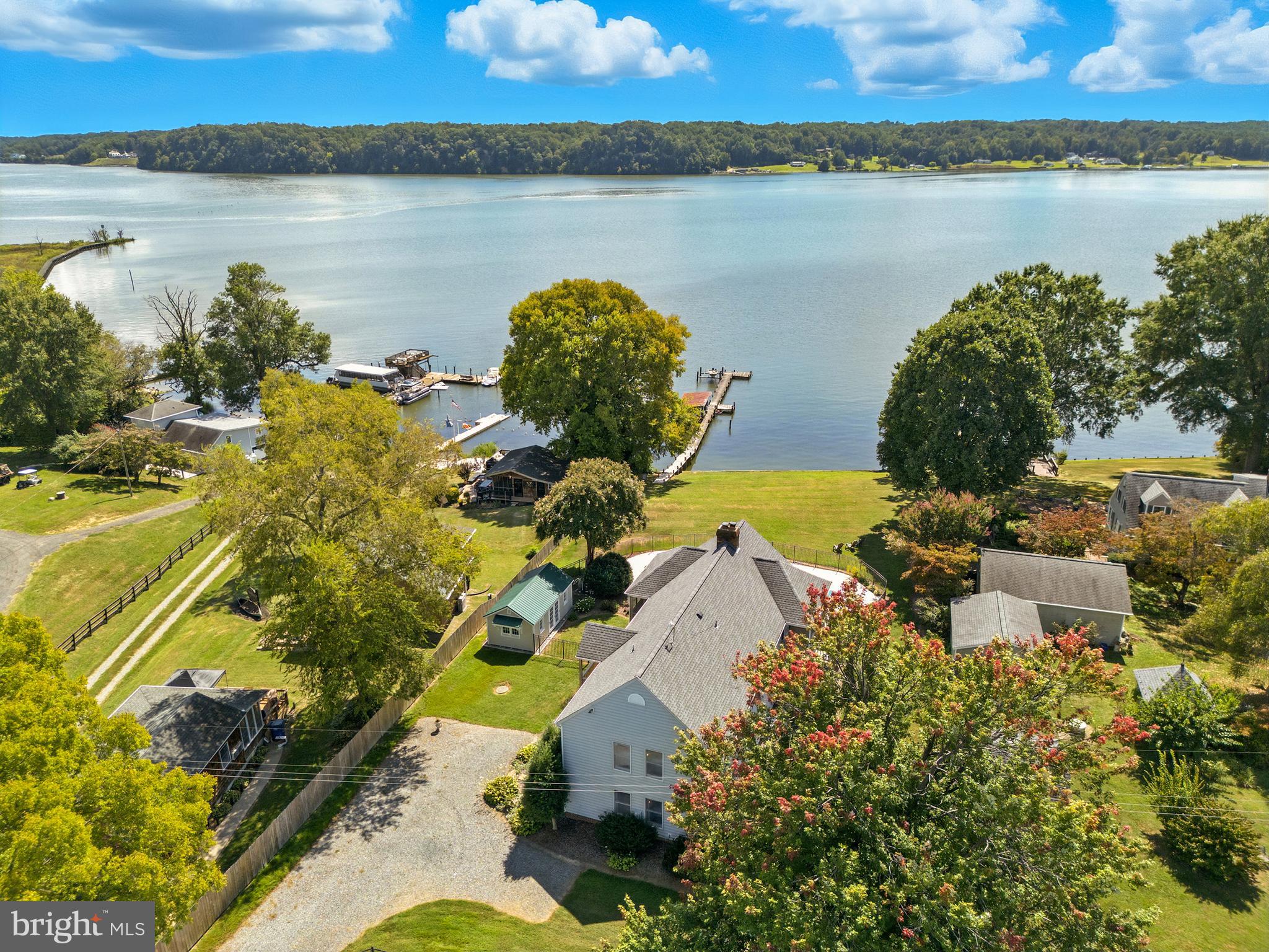 638 Marlborough Point Road Stafford, VA 22554 - Photo 55 of 58 an aerial view of a house with a lake view