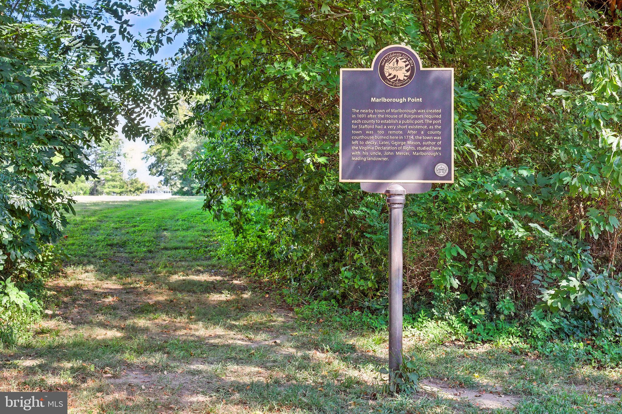 638 Marlborough Point Road Stafford, VA 22554 - Photo 56 of 58 a sign that is sitting on a side of a tree