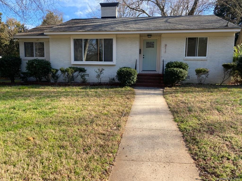 911 Scaleybark Road Charlotte, NC 28209 - Photo 1 of 22 a front view of a house with garden