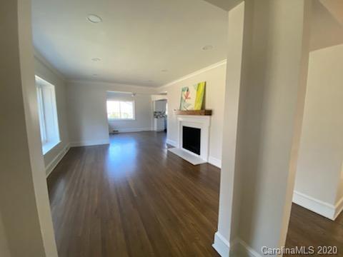 911 Scaleybark Road Charlotte, NC 28209 - Photo 2 of 22 a view of livingroom with wooden floor