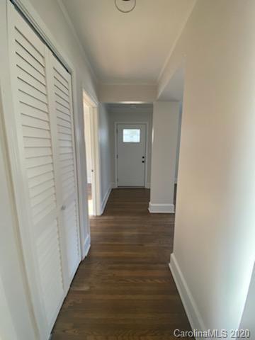 911 Scaleybark Road Charlotte, NC 28209 - Photo 15 of 22 a view of a hallway with wooden floor