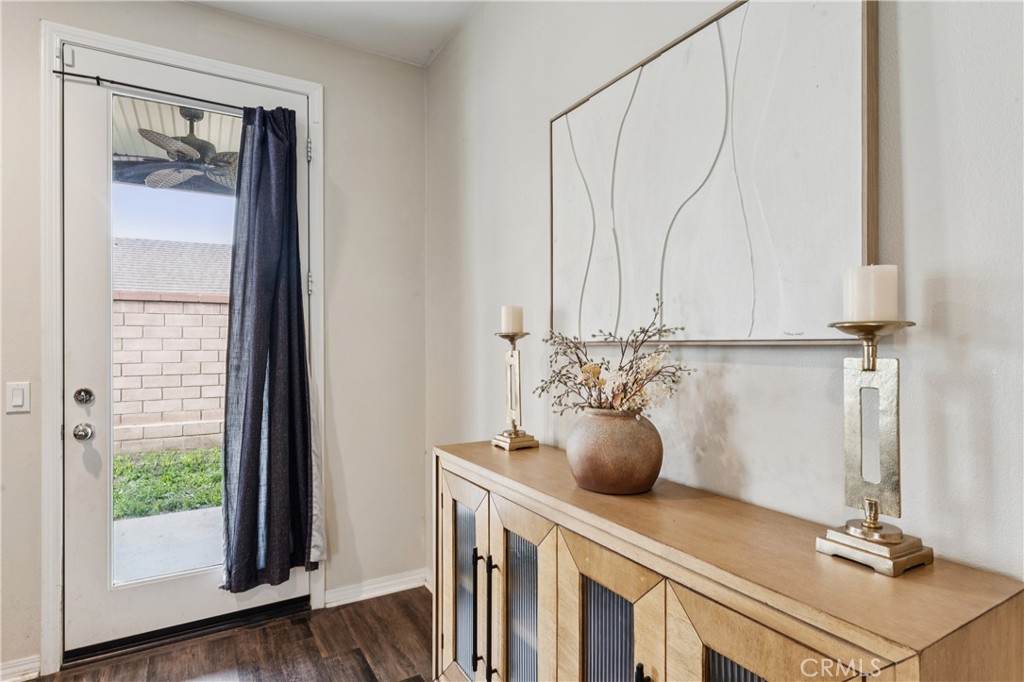 30535 Ridgely Way Menifee, CA 92584 - Photo 23 of 37 a kitchen with a sink and a potted plant