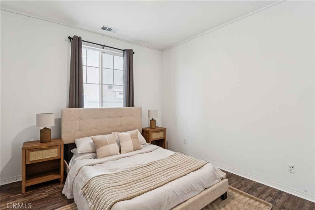 30535 Ridgely Way Menifee, CA 92584 - Photo 8 of 37 a bedroom with a bed and a window