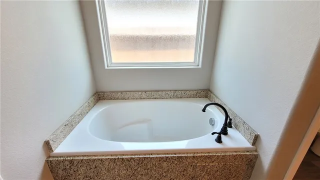 a bathroom with a tub