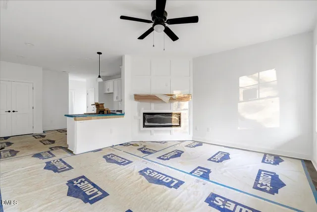 a kitchen with a appliances cabinets and a window