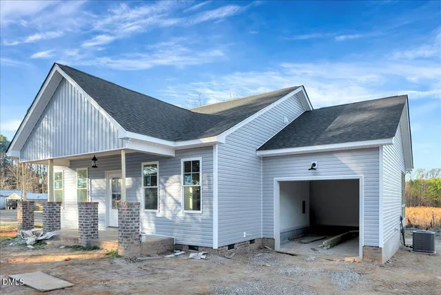 a front view of a house with a porch