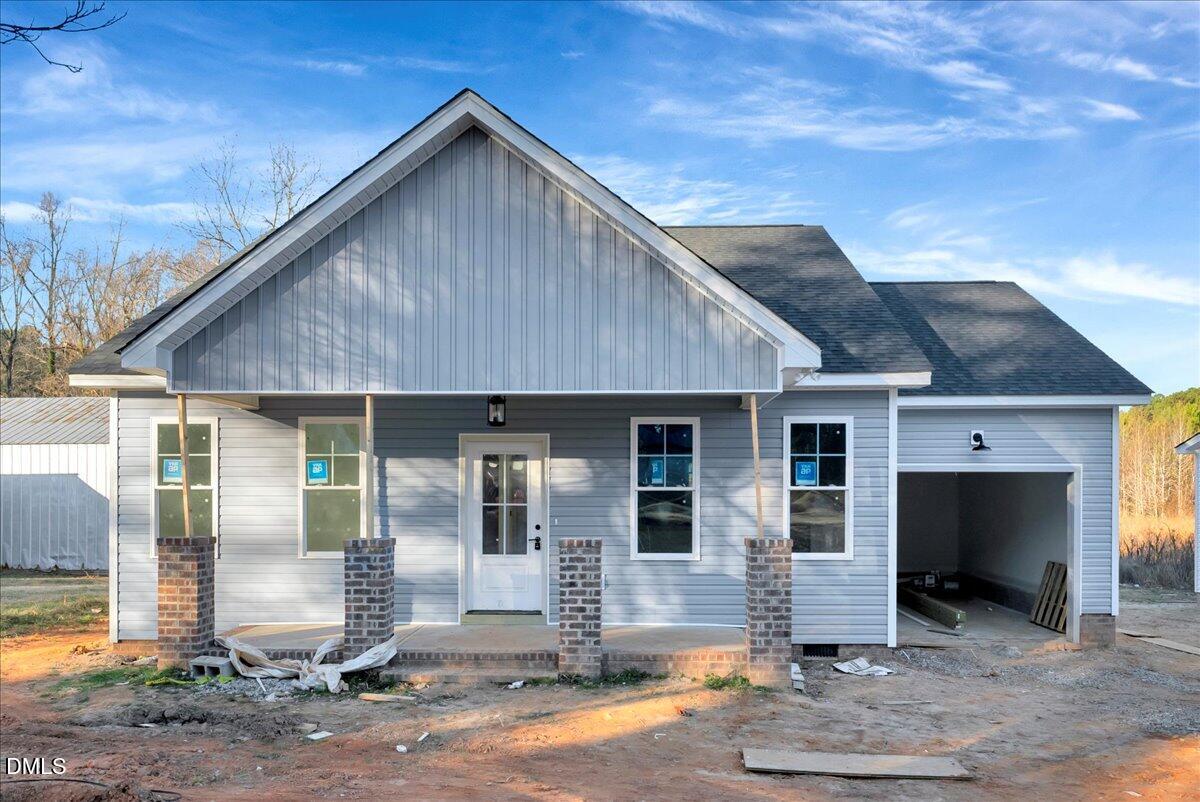 207 Terrell Street Norlina, NC 27563 - Photo 22 of 23 a front view of a house with garden