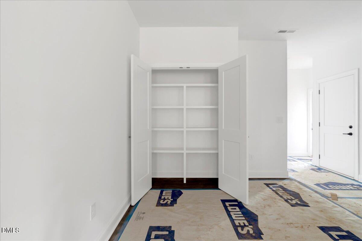 207 Terrell Street Norlina, NC 27563 - Photo 4 of 23 a room with a bed and a window