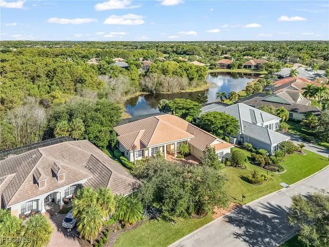 an aerial view of a house with a garden