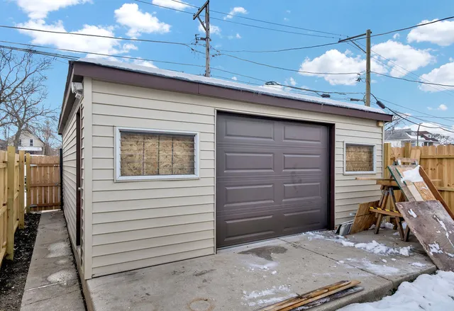 a view of a house with a garage