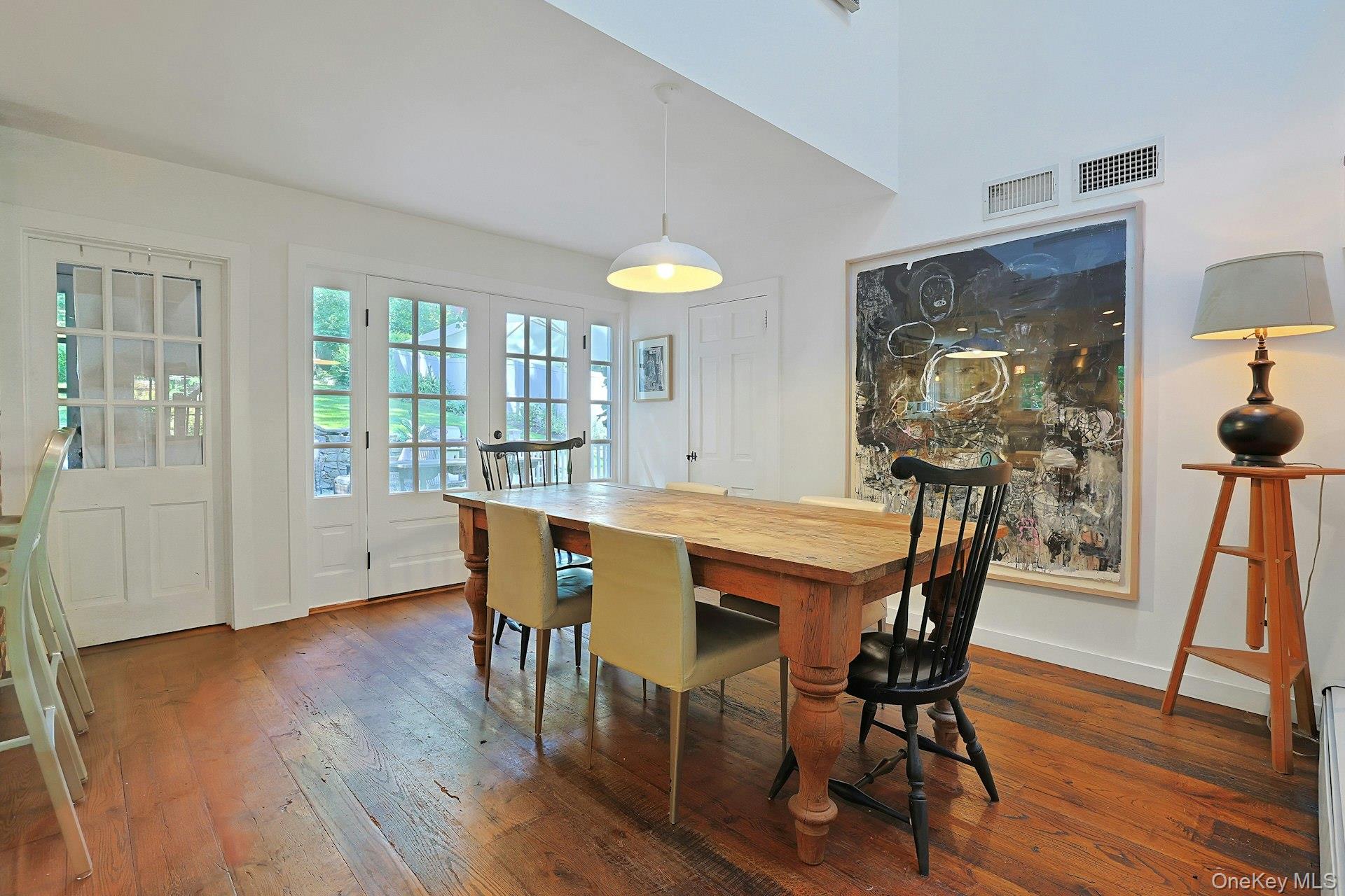 65 Douglas Road Chappaqua, NY 10514 - Photo 13 of 41 A bright and welcoming dining area with effortless access to the patio, creating the perfect flow for everyday meals, relaxed entertaining, and enjoying the beauty of the outdoors.