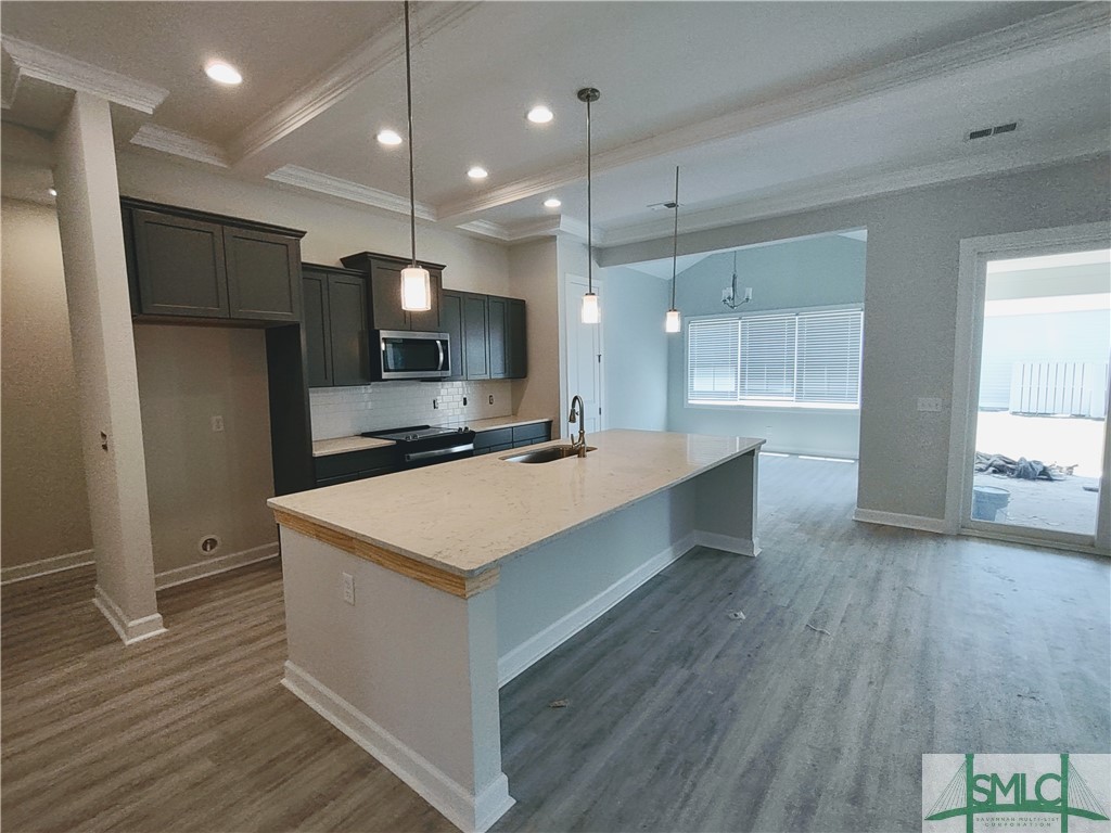 134 Bramswell Road Pooler, GA 31322 - Photo 5 of 30 KITCHEN WITH HUGE ISLAND, PENDANT LIGHTING, UPGRAD