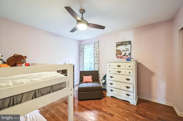 a bedroom with a bed and a closet