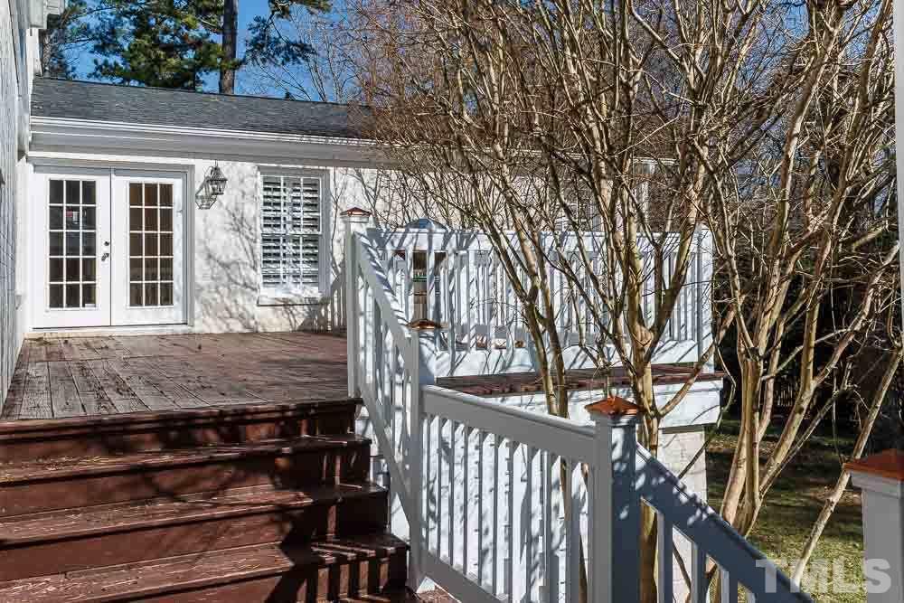 308 Buncombe Street Raleigh, NC 27609 - Photo 23 of 25 a view of a wooden fence and a tree