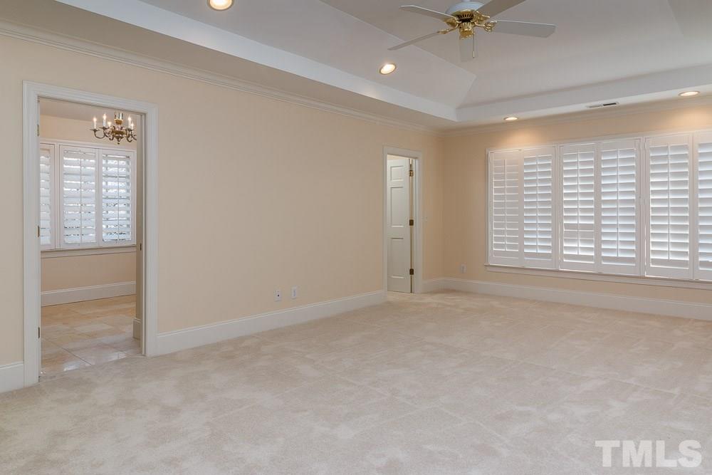 308 Buncombe Street Raleigh, NC 27609 - Photo 9 of 25 a view of an empty room with a window