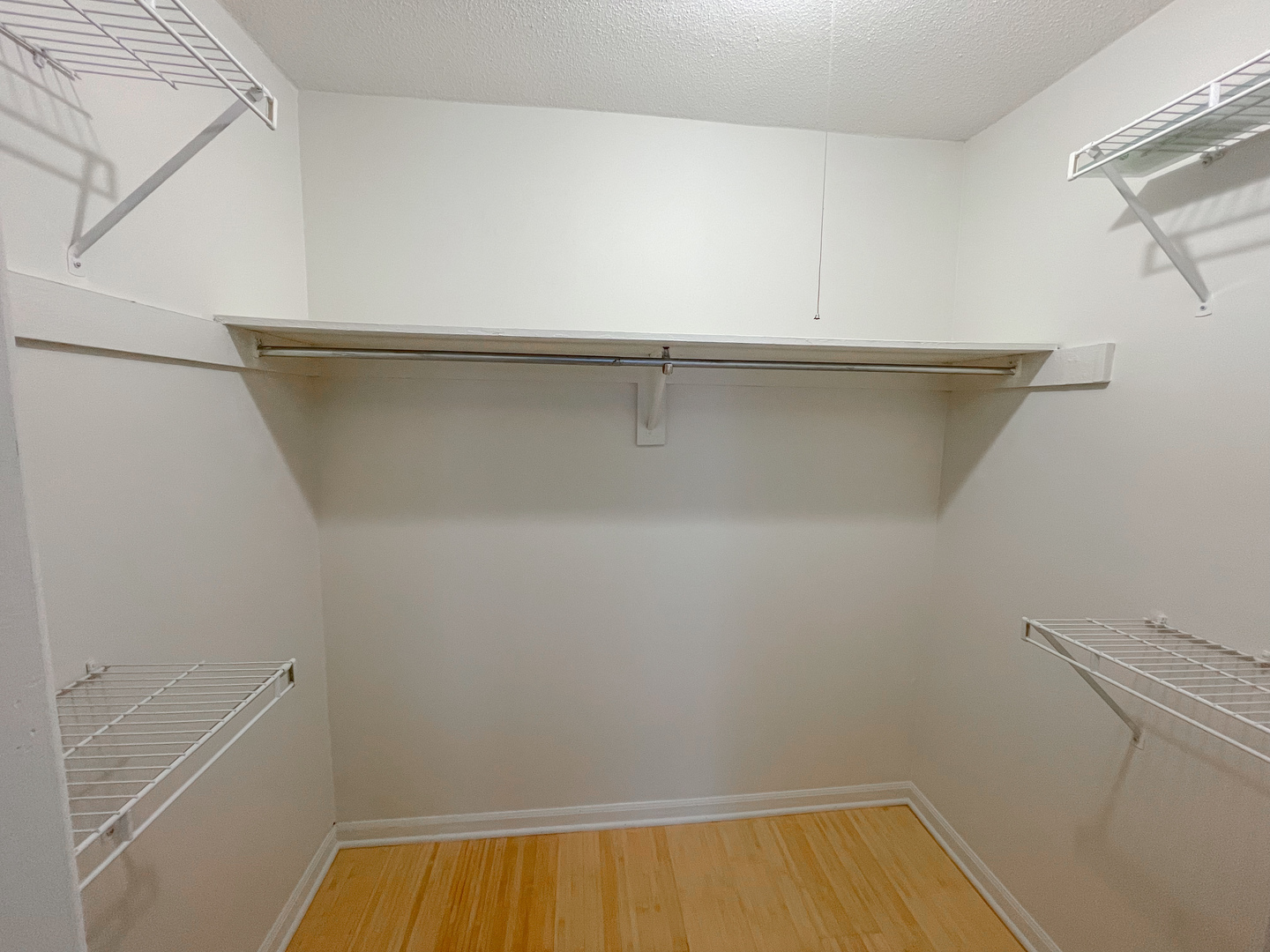 405 North Wabash Avenue, Unit 1410 Chicago, IL 60611 - Photo 12 of 18 a view of a room with racks on the wall