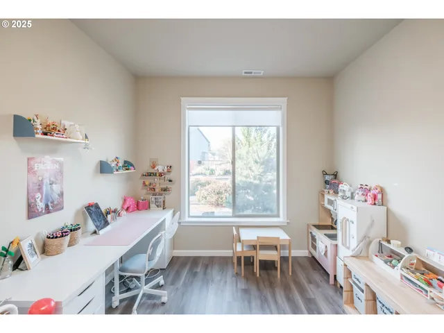 a bathroom with a sink vanity and a mirror