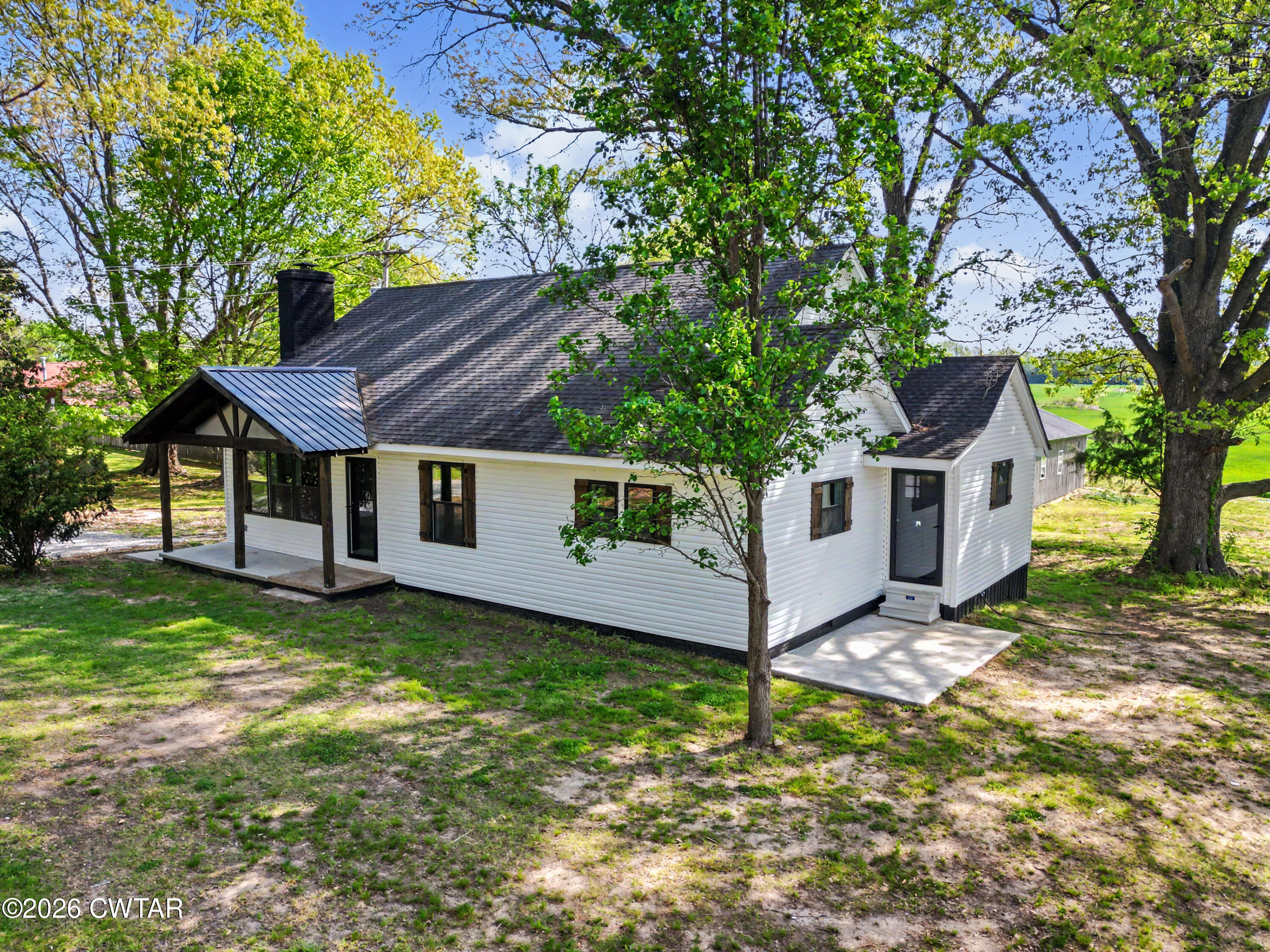 4177 Gum Flat Road Bells, TN 38006 - Photo 4 of 30 a house view with a garden space