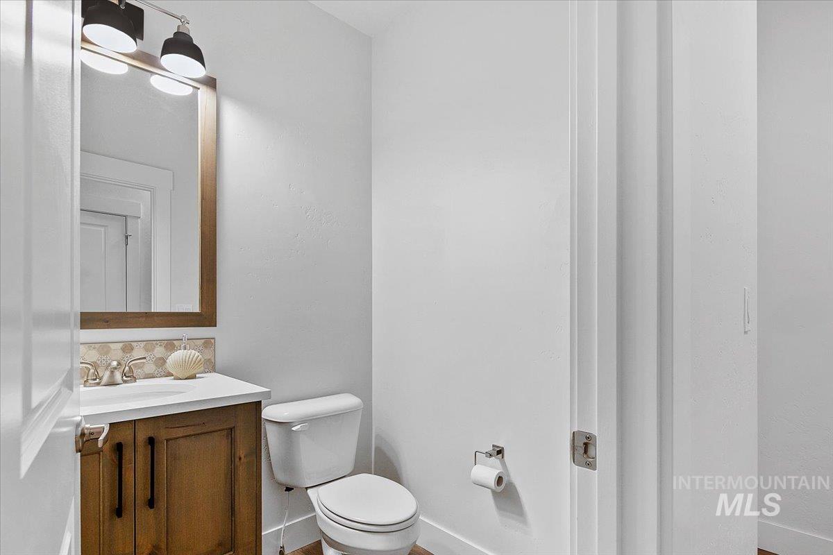 1685 Shoal Point Avenue Middleton, ID 83644 - Photo 11 of 44 Bathroom featuring vanity and tasteful backsplash