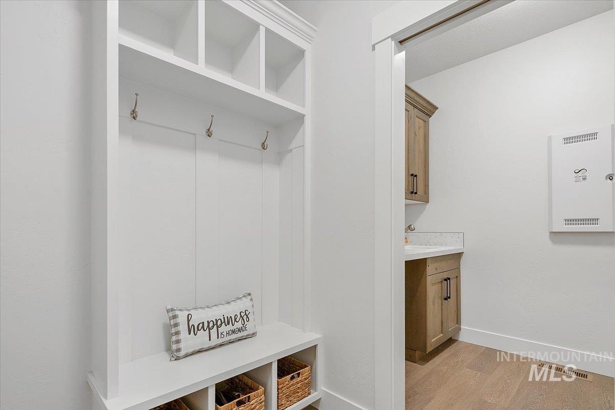 1685 Shoal Point Avenue Middleton, ID 83644 - Photo 12 of 44 Mudroom featuring light wood-style floors and baseboards