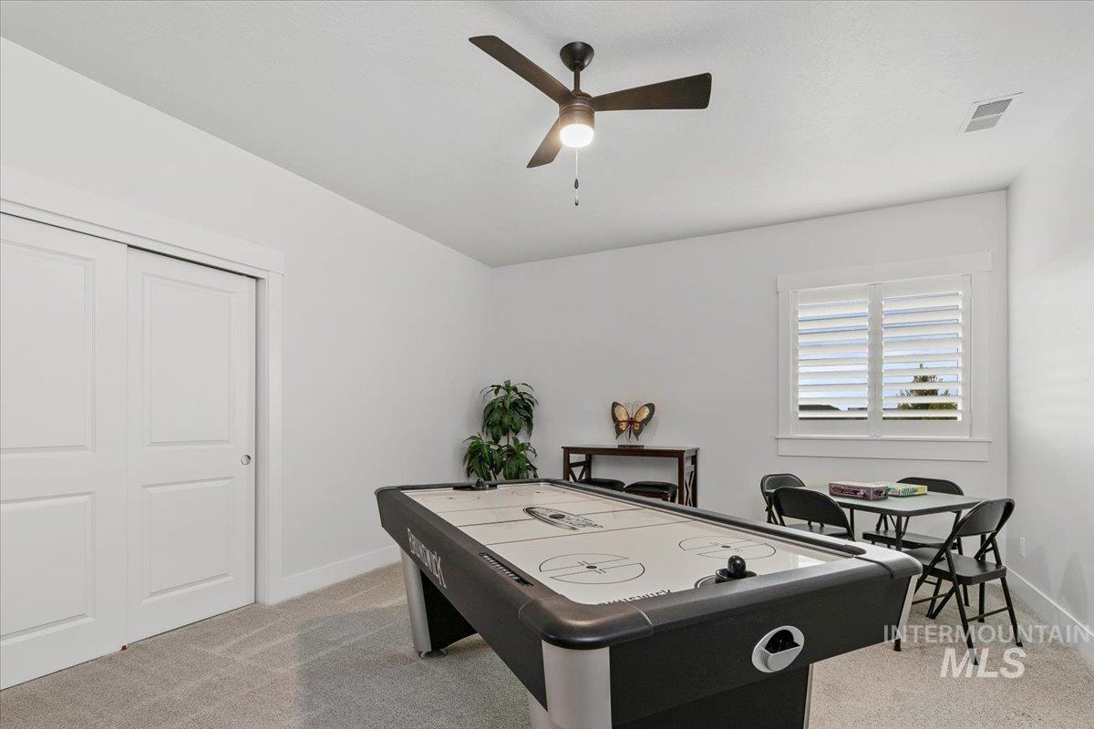 1685 Shoal Point Avenue Middleton, ID 83644 - Photo 36 of 44 Playroom featuring light colored carpet and ceiling fan