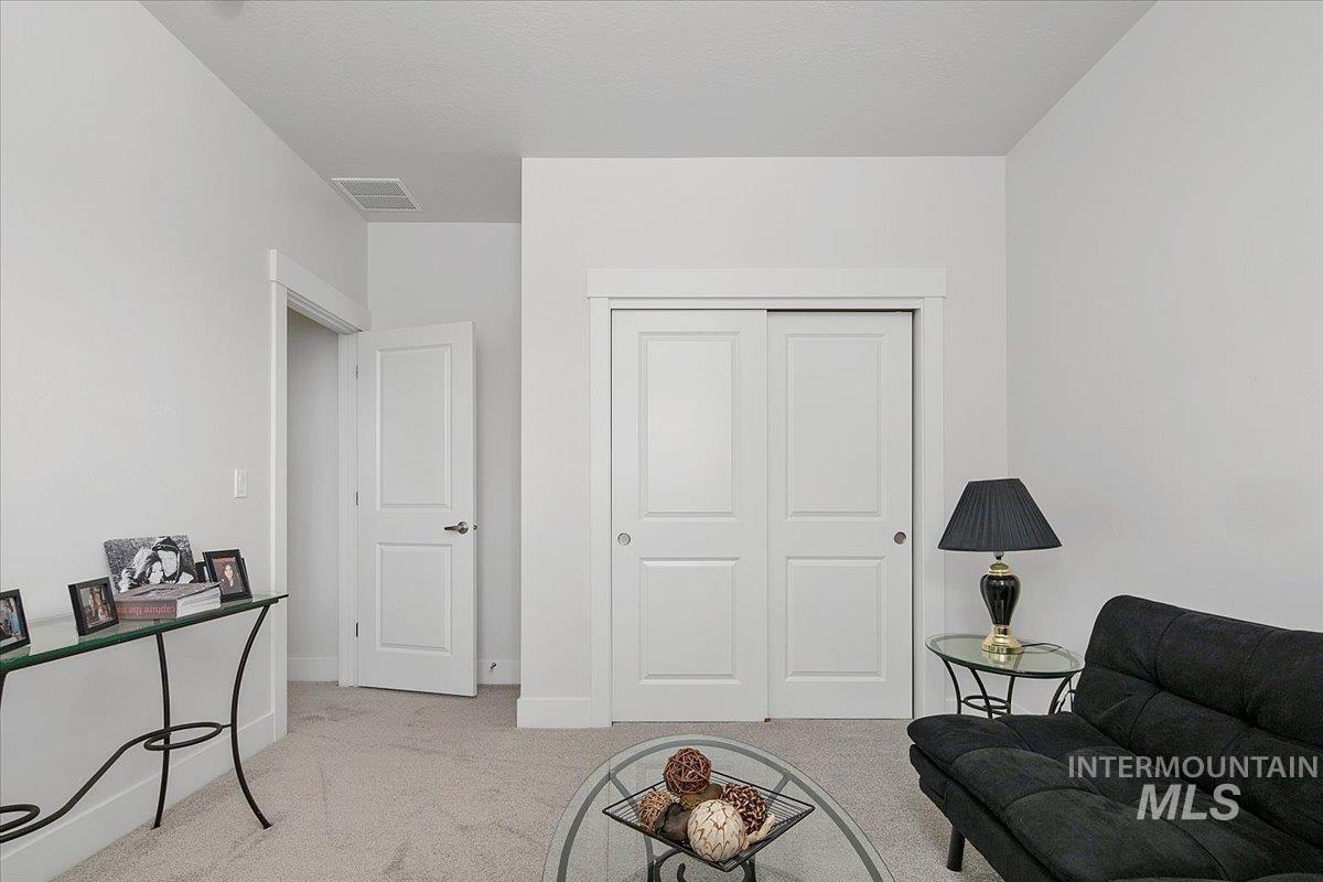 1685 Shoal Point Avenue Middleton, ID 83644 - Photo 39 of 44 Sitting room with light carpet and baseboards